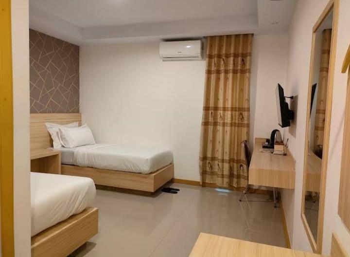 Wisma Sidapore teluk bayur Salakan
